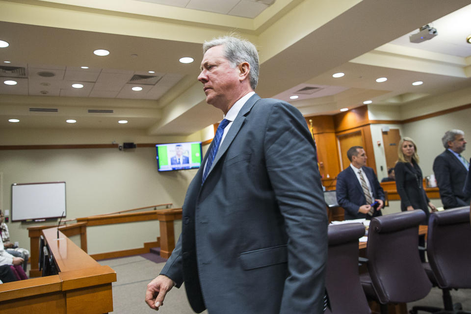 Former DeKalb County police officer Robert Olsen becomes emotional during his sentencing, Friday, Nov. 1, 2019, in Decatur, Ga.. Olsen, who was convicted of aggravated assault and other crimes in the fatal shooting of an unarmed, naked man, was sentenced Friday to 12 years in prison.. (Alyssa Pointer/Atlanta Journal-Constitution via AP)