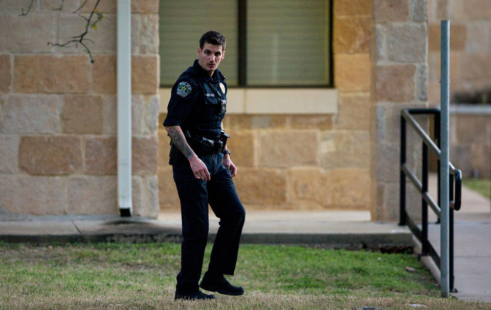 <p>An Austin police officer secures the scene near another explosion in the 9800 block of Brodie Lane in Austin, Texas, on Tuesday, March 20, 2018. Emergency teams were responding to another reported explosion in Texas’ capital, this one at a Goodwill store in the southern part of the city. (Photo: Nick Wagner/Austin American-Statesman via AP) </p>