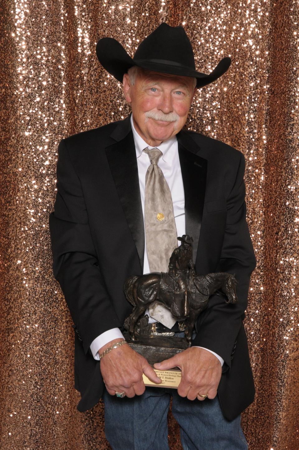 In 2017, Kremlin-based sculptor and painter Harold T. Holden became the first Oklahoma artist inducted into the National Cowboy & Western Heritage Museum's storied Hall of Great Westerners. Holden created the bronze "Wrangler" statue the museum gives to recipients of the honor.