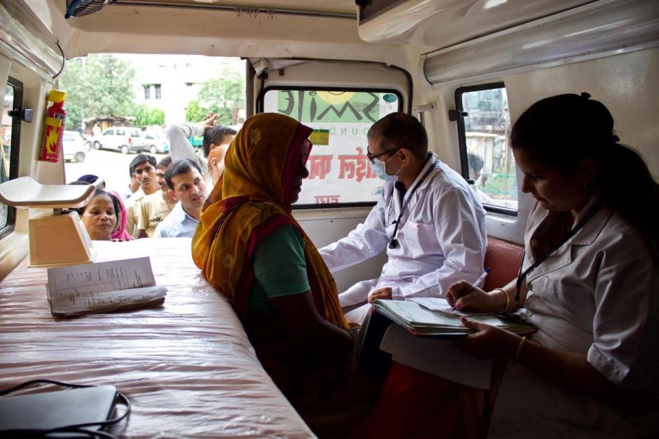 The Smile Foundation's doctors treat patients in a mobile hospital, stepping in where India's underfunded public health system falls short (Adam Withnall/The Independent)