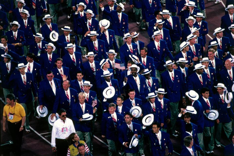 <p>The American athletes kept it classic in 1992 with blue peacoats and white hats. (Getty) </p>