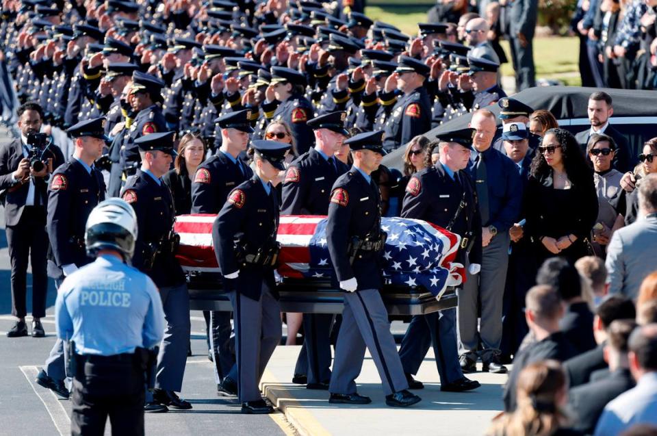 The casket of Raleigh Police Officer Gabriel Torres is brought into Cross Assembly Church in Raleigh, N.C. during his funeral Saturday, Oct. 22, 2022. Officer Torres was killed in a mass shooting Oct. 13.