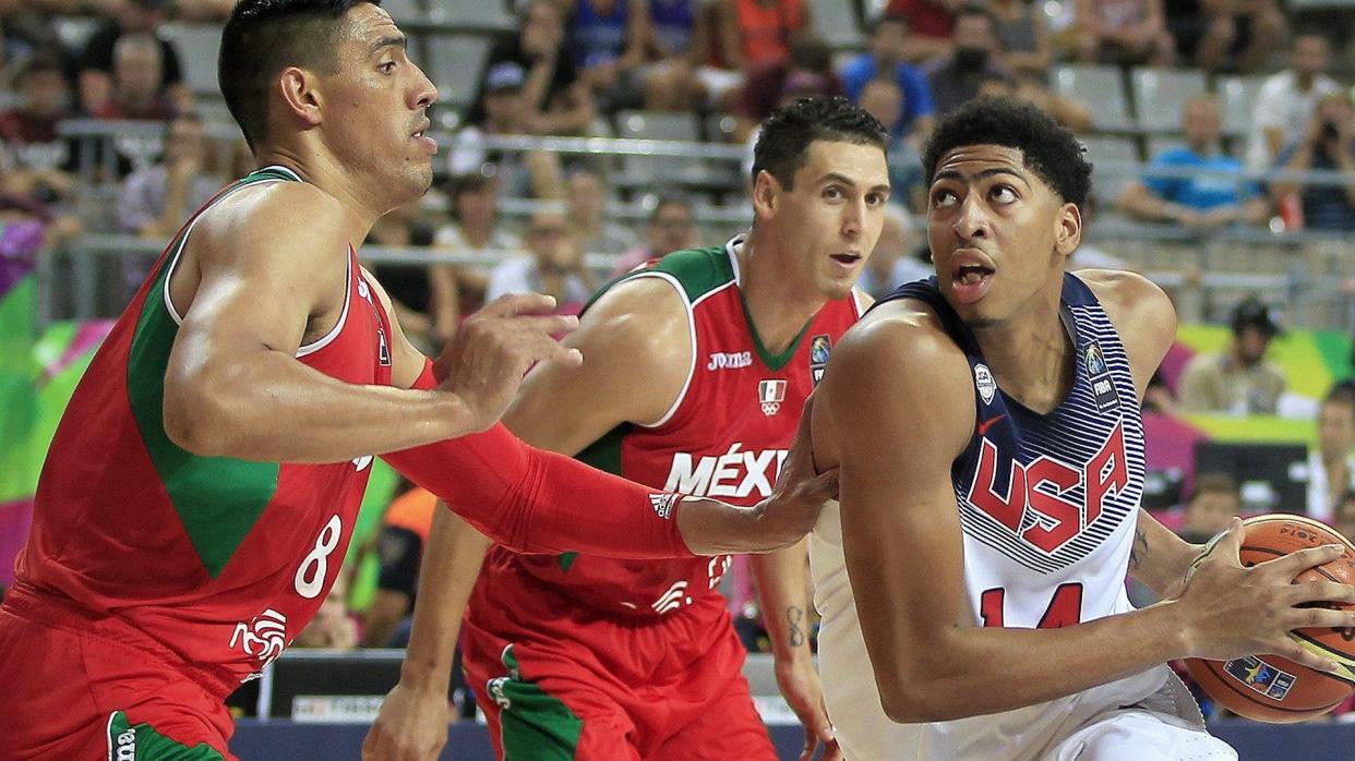 Mandatory Credit: Photo by Andreu Dalmeu/EPA/Shutterstock (8101940a)Us Player Anthony Davis (r) in Action Against Mexico's Gustavo Ayon (l) and Marco Ramos (c) During the Fiba Basketball World Cup Quarter-final Match Match Between the Usa and Mexico at the Palau San Jordi Pavilion in Barcelona Northeastern Spain 06 September 2014 Spain BarcelonaSpain Basketball World Cup 2014 - Sep 2014.