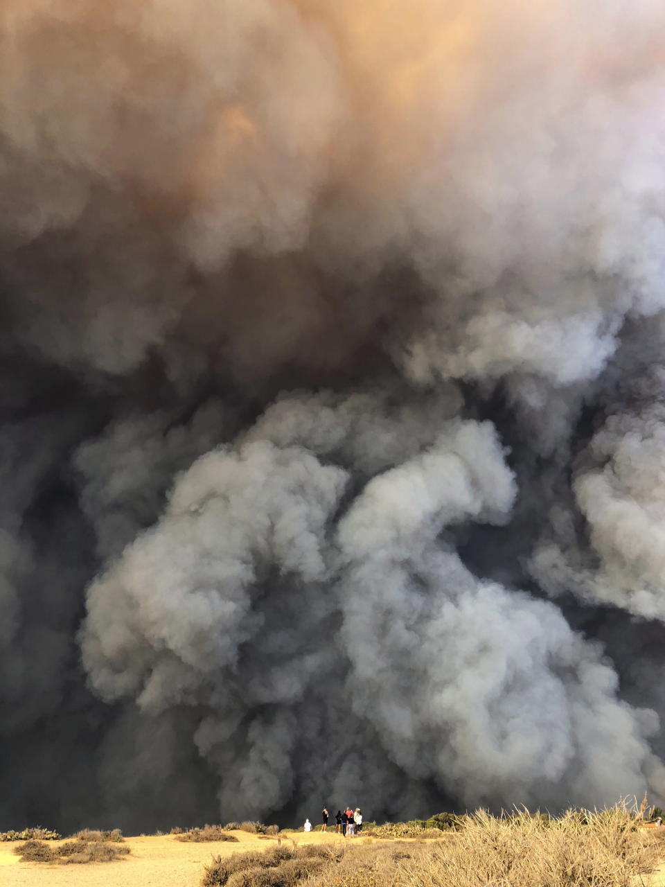 <p>In this Friday, Nov. 9, 2018 photo, smoke from the wildires fills the air in Malibu, Calif. Los Angeles County fire Chief Daryl Osby said Saturday that firefighters told him they were working in the toughest, most extreme conditions they had seen in their lives on Friday night.<br>He says conditions are far better Saturday, with a lull in winds that are expected to return Sunday.<br>(Courtesy of Ben Watkins via AP) </p>