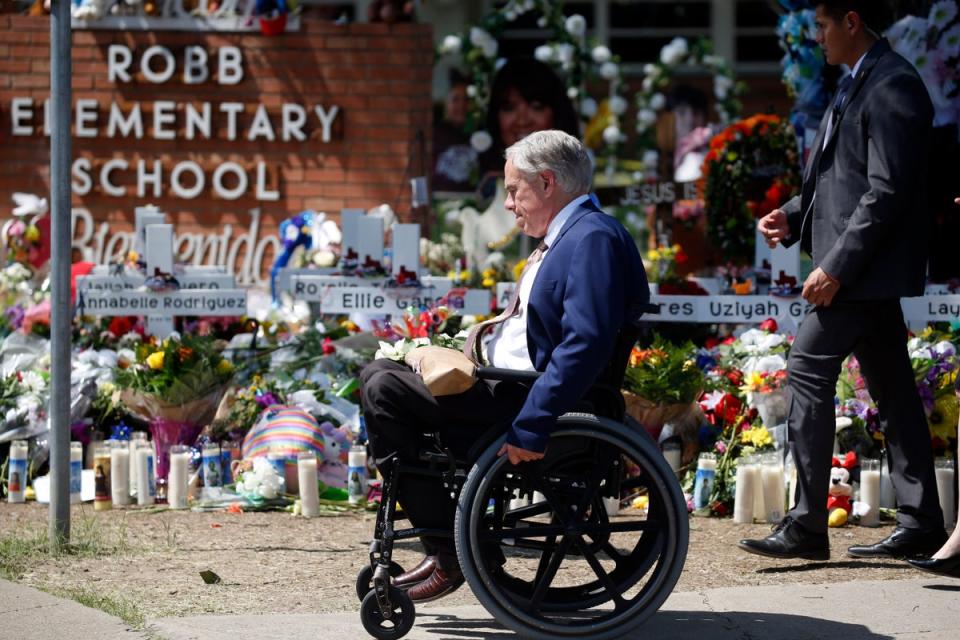 Texas Governor Greg Abbott at the memorial at the school (Copyright 2022 The Associated Press. All rights reserved)