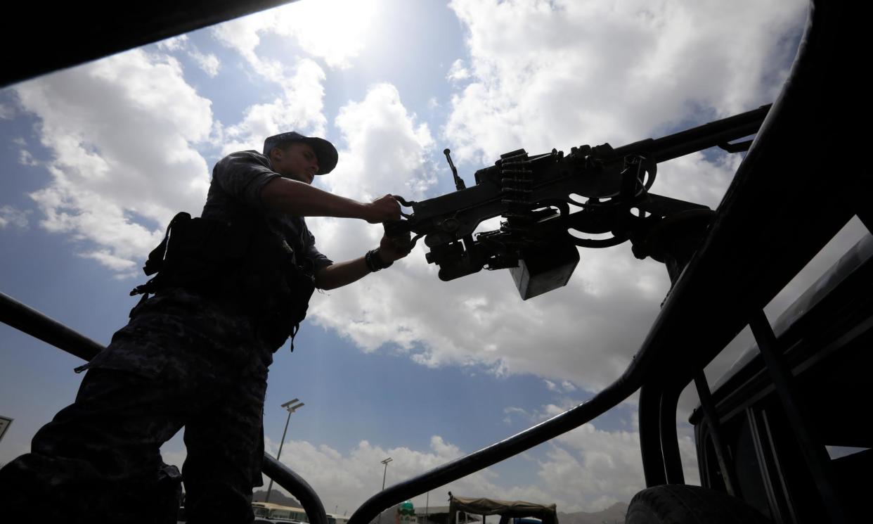 <span>A Houthi soldier holds a machine gun on a vehicle while on patrol in Sana'a, Yemen.</span><span>Photograph: Yahya Arhab/EPA</span>
