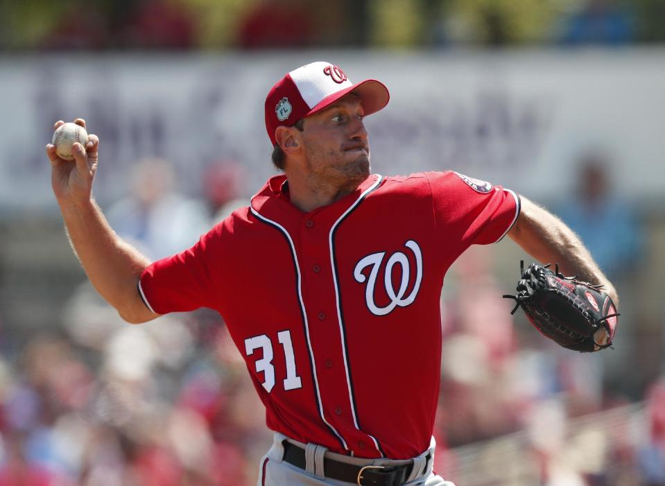 Washington Nationals starting pitcher Max Scherzer works in the first inning of a spring training baseball game against the St. Louis Cardinals, Wednesday, March 22, 2017, in Jupiter, Fla. (AP Photo/John Bazemore)