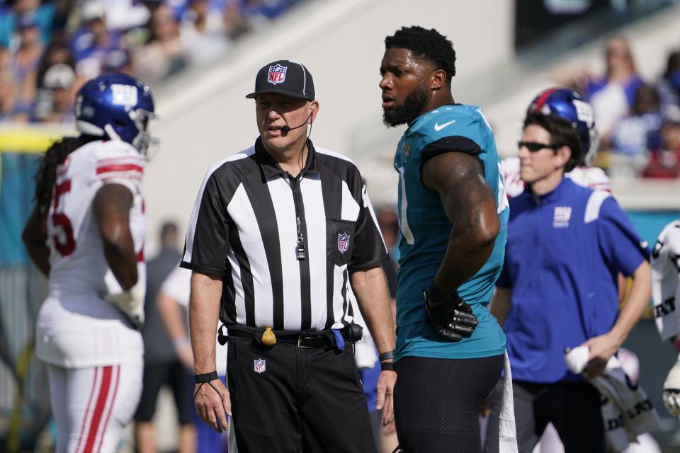 Jacksonville Jaguars linebacker Josh Allen (41) talks to an official after a challenge against the New York Giants during the second half of an NFL football game Sunday, Oct. 23, 2022, in Jacksonville, Fla. (AP Photo/John Raoux)