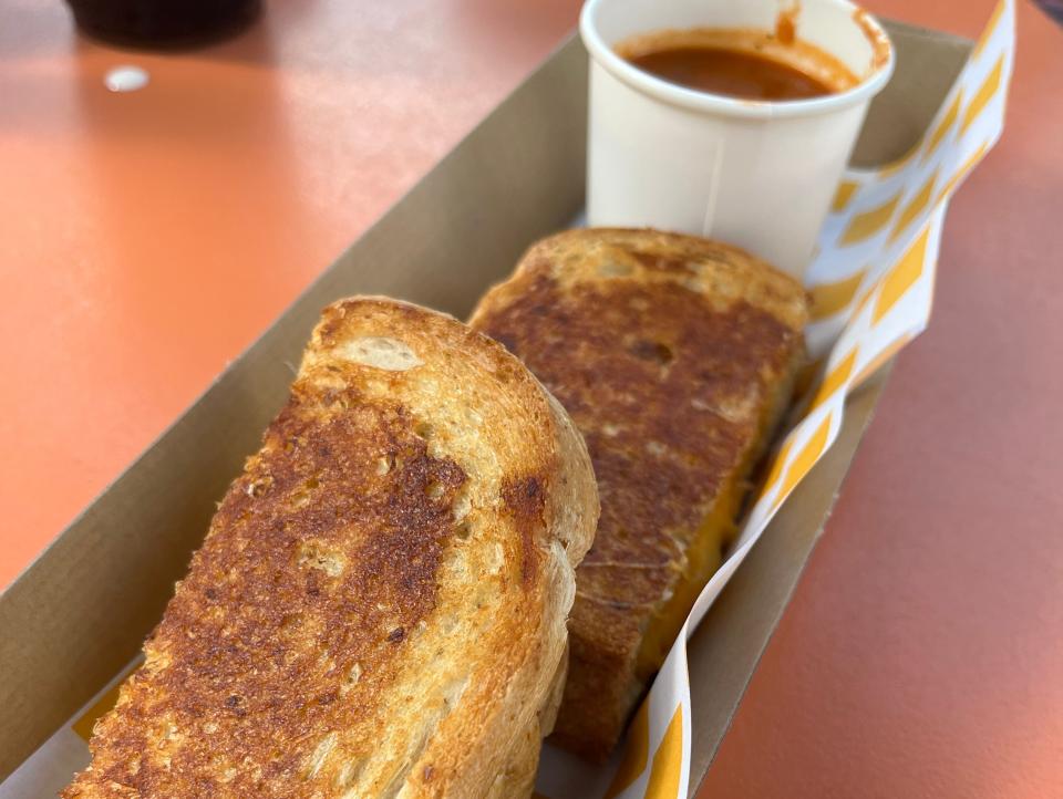 grilled cheese and tomato soup from woddy's lunchbox in toy story land in disney world
