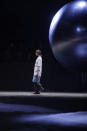 A model wears a creation as part of the Gucci men's Fall-Winter 2020/21 collection, that was presented in Milan, Italy, Tuesday, Jan. 14, 2020. (AP Photo/Luca Bruno)