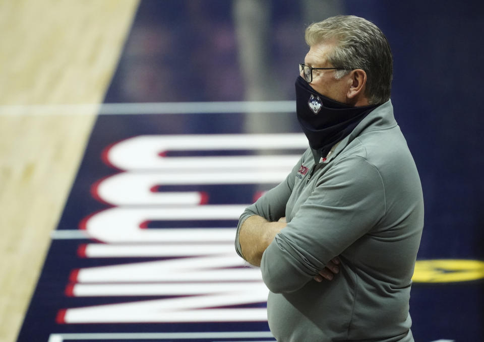 Connecticut head coach Geno Auriemma watches from the sideline during the second half of an NCAA college basketball game against Creighton in Storrs, Conn., Thursday, Dec. 17, 2020. (David Butler II/Pool photo via AP)