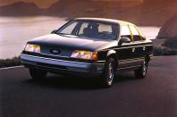 <p>Going global paid off when developing the Escort, but Ford knew it couldn’t apply the same recipe to the mid-size, front-wheel-drive model it planned to release for 1986. Japanese rivals were encroaching on its territory, and there was too much at stake not to develop the car with the American market in mind.</p><p>Launched to replace the LTD, the Taurus arrived with an aerodynamic design and either a four- or a six-cylinder engine. Ford paid particular attention to the model’s build quality to avoid costly recalls that hurt its sales and its reputation. At launch, the Taurus was praised as one of Ford’s all-time greatest hits.</p><p>Ford sold <strong>178,737 Taurus saloons</strong> and <strong>57,625 estates</strong> in 1986. Those figures increased to <strong>294,576</strong> and <strong>93,001</strong>, respectively, in 1988. Escort sales (including the EXP) totalled <strong>422,035 units</strong> that year.</p>