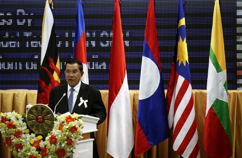 Cambodia's Prime Minister Hun Sen delivers his opening remarks for the 21st Association of Southeast Asian Nations, or ASEAN, Summit in Phnom Penh, Cambodia, Sunday, Nov. 18, 2012. (AP Photo/Vincent Thian)