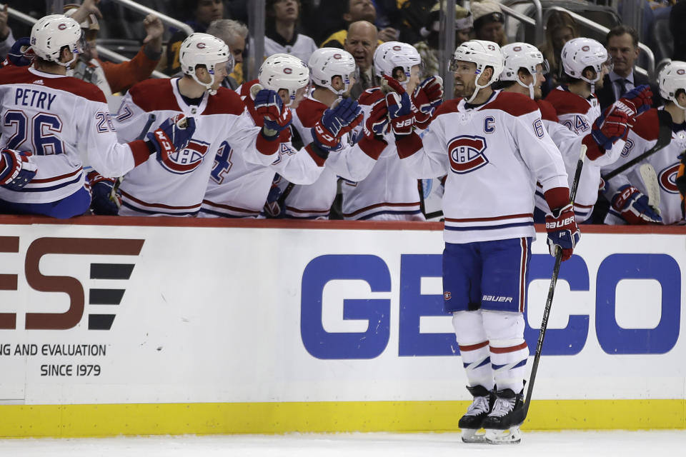 Montreal Canadiens' Shea Weber (6) returns to the bench after scoring during the second period of an NHL hockey game against the Pittsburgh Penguins in Pittsburgh, Tuesday, Dec. 10, 2019. (AP Photo/Gene J. Puskar)