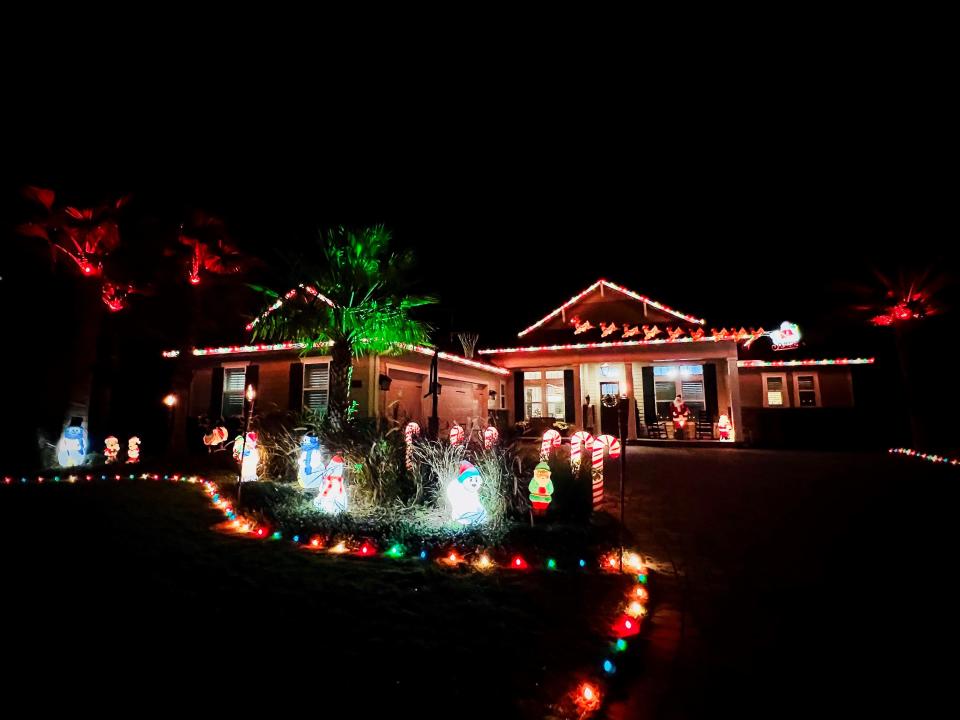 Visitors to the holiday light display on 20 Mile Road can scan a QR code to donate to a Jacksonville children's hospital.