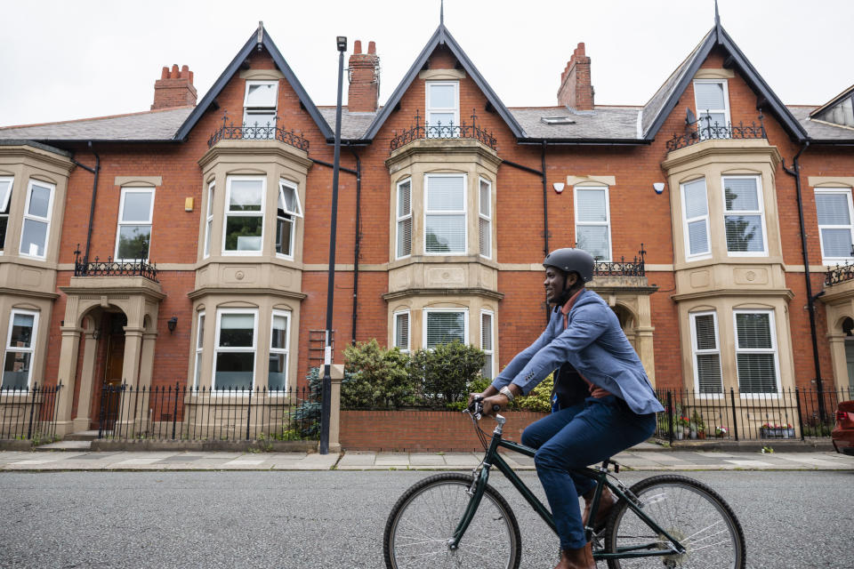 The property market is being propelled onwards by an imbalance of supply and demand. Photo: Getty Side view of a businessman wearing a bike helmet and casual businesswear, riding a bike through a residential district in Newcastle-upon-Tyne on his commute to work.