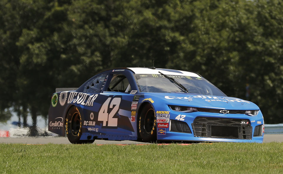 Kyle Larson (42) makes his way around the course during practice for a NASCAR Cup series auto race, Saturday, Aug. 4, 2018, in Watkins Glen, N.Y. (AP Photo/Julie Jacobson)