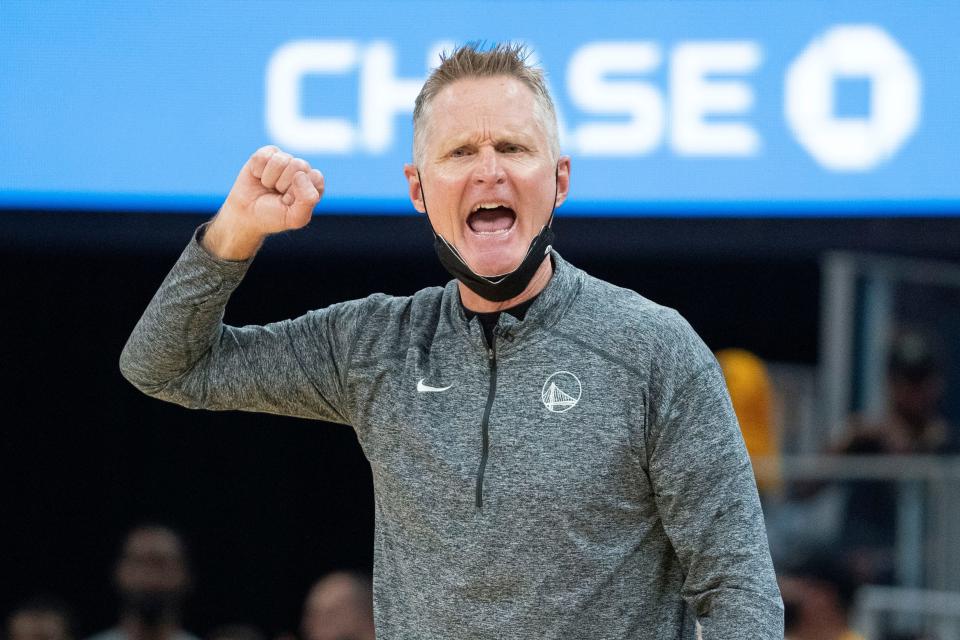 Golden State Warriors head coach Steve Kerr instructs his team against the Dallas Mavericks in their Western Conference finals matchup.
