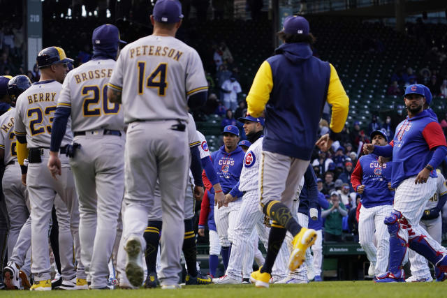 Milwaukee Brewers left fielder Andrew McCutchen catches for an out