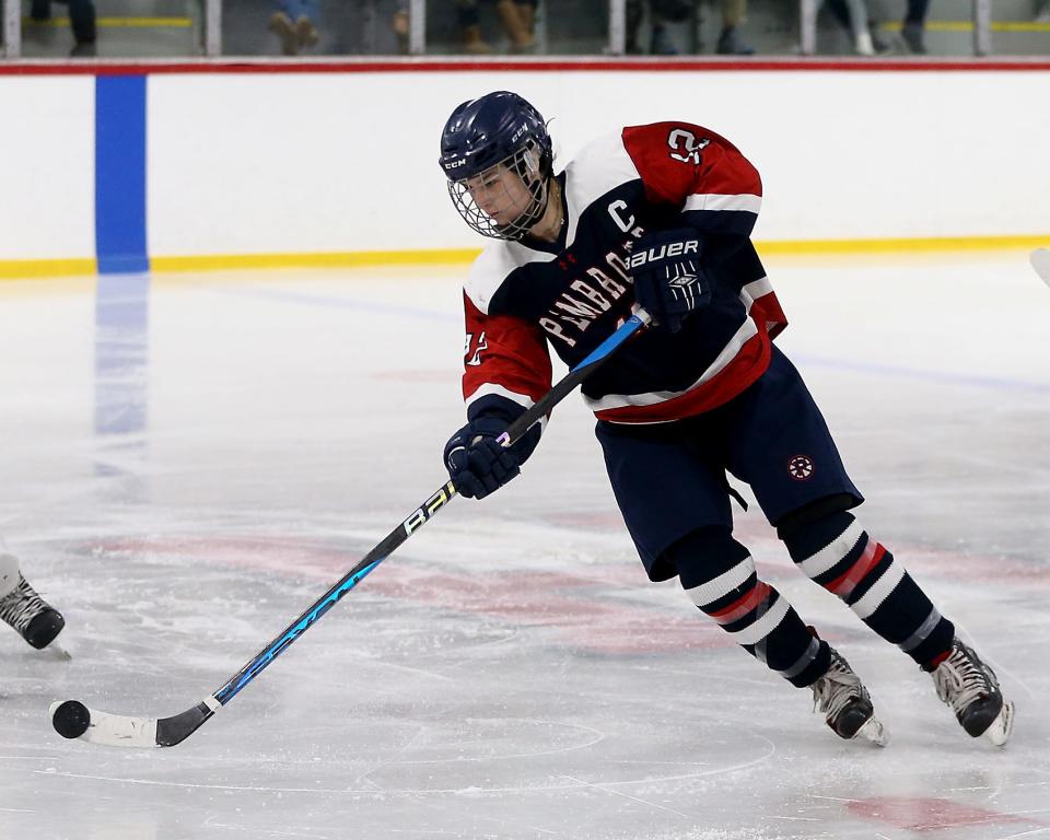 Pembroke's Maria Cantino gathers in the puck during second period action of their game against Hingham at Pilgrim Arena on Saturday, Feb. 18, 2023.