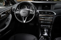 <p>Aside from the typical button layout, the Infiniti will sport a variety of real-wood and leather combos based on trim level, along with active noise cancellation.</p>