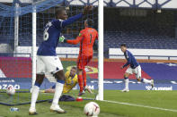 Everton's James Rodriguez , right, scores his side's fourth goal during the English Premier League soccer match between Everton and Brighton at the Goodison Park stadium in Liverpool, England, Saturday, Oct. 3, 2020. (Jan Kruger/Pool via AP)