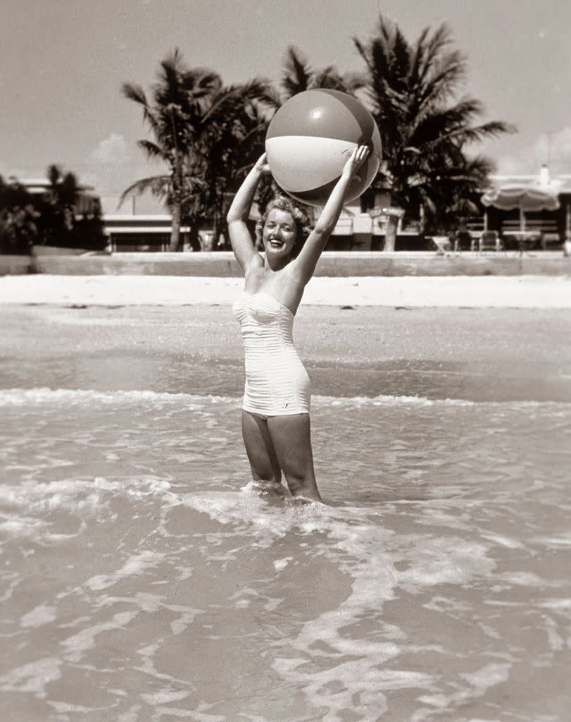 Woman standing on the shoreline: 1950