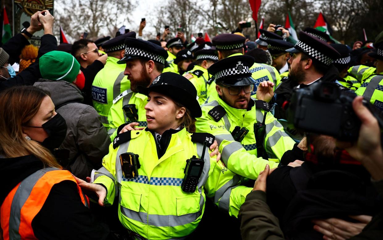 Police officers during a Pro-Palestinian demonstration in central London in January