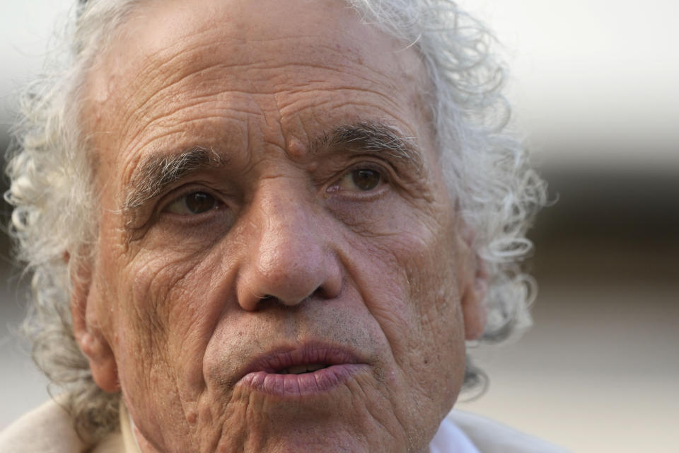 Director Abel Ferrara answers to a journalist's question during an interview with the Associated Press on his latest movie "Padre Pio" in Rome, Tuesday, Aug. 23, 2022. Abel Ferrara, whose gritty New York exploitation films of the 1980s and 1990s delved into the soulless evils of drug addiction, corruption and sexual violence, pays homage to one of Italy’s best-known and most revered saints in his newest film, “Padre Pio.” (AP Photo/Gregorio Borgia)