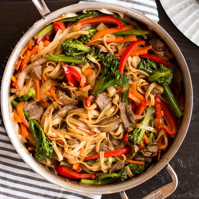 <p>Fox and Briar</p><p>This quick and easy beef noodle stir fry takes under 30 minutes and is easily made gluten-free! Full of veggies, beef and a flavorful sauce, your whole family will love it!</p><p><strong>Get the recipe: <a href="https://www.foxandbriar.com/beef-noodle-stir-fry/" rel="nofollow noopener" target="_blank" data-ylk="slk:Beef Noodle Stir Fry;elm:context_link;itc:0;sec:content-canvas" class="link rapid-noclick-resp">Beef Noodle Stir Fry</a></strong></p>