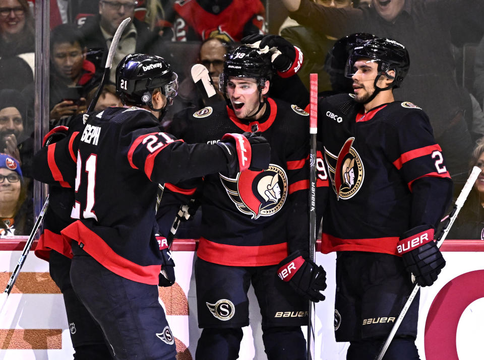 Ottawa Senators right wing Drake Batherson (19) celebrates after his goal against the New York Islanders during second-period NHL hockey game action in Ottawa, Ontario, Friday, Nov. 24, 2023. (Justin Tang/The Canadian Press via AP)