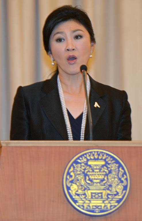 Thai Prime Minister Yingluck Shinawatra speaks during a press conference at Government House in Bangkok on November 18, 2013