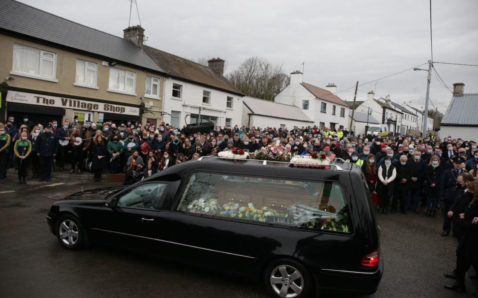 The hearse carrying the coffin leaves St Brigid's Church, Mountbolus, Co Offaly, at the end of the funeral of Ashling Murphy - Damien Eagers 