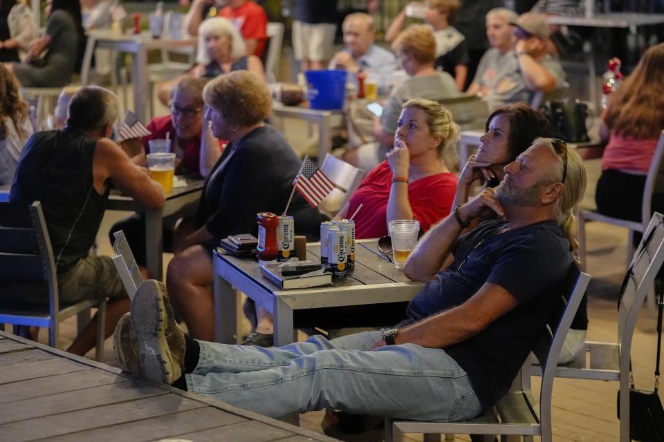 Nick Glaub, of Ross, Ohio, watches the U.S. presidential debate between former President Donald Trump and President Joe Biden, Thursday, June 27, 2024, in Hamilton, Ohio. (AP Photo/Joshua A. Bickel)