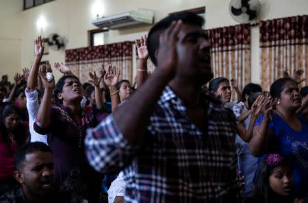 Members of Zion Church, which was bombed on Easter Sunday, pray at a community hall in Batticaloa, Sri Lanka, May 5, 2019. REUTERS/Danish Siddiqui