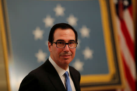 U.S. Treasury Secretary Steven Mnuchin arrives at a White House reception for Congressional Medal of Honor recipients in the East Room of the White in Washington, U.S., September 12, 2018. REUTERS/Carlos Barria