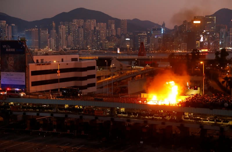 Protesters clash with police outside Hong Kong Polytechnic University (PolyU) in Hong Kong