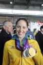 London 2012 Olympic athlete Alicia Coutts arrives at Sydney Airport Wednesday August 15, 2012 . (AAP Image/Mick Tsikas) NO ARCHIVING