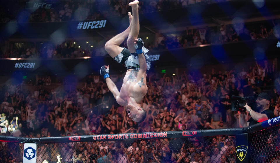 SALT LAKE CITY, UT - JULY 29:  Justin Gaethje flips after beating Dustin Poirier during their BMF Title Lightweight fight at UFC 291 at the Delta Center July 29, 2023 at the  in Salt Lake City, Utah. (Photo by Chris Gardner/Getty Images)