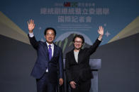 Taiwanese Vice President Lai Ching-te, also known as William Lai, left, celebrates his victory with running mate Bi-khim Hsiao in Taipei, Taiwan, Saturday, Jan. 13, 2024. The Ruling-party candidate emerged victorious in Taiwan's presidential election on Saturday and his opponents conceded, a result that will chart the trajectory of the self-ruled democracy's relations with China over the next four years. (AP Photo/Louise Delmotte)