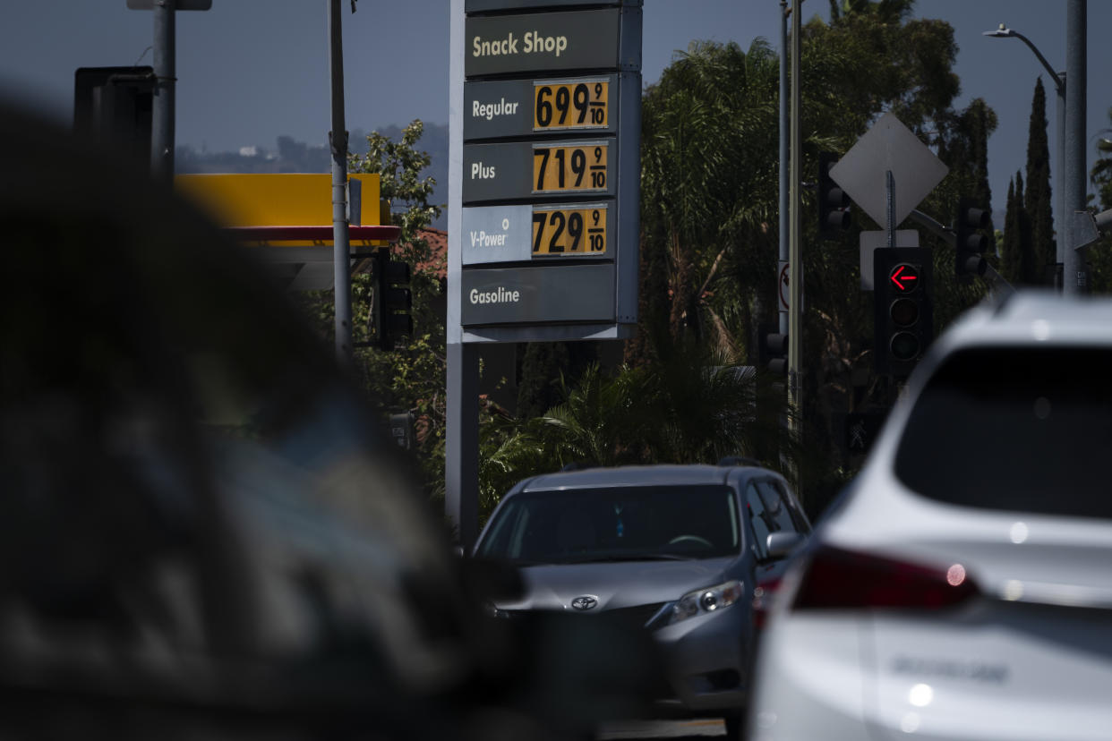 High gas prices are shown in Los Angeles, Tuesday, May 24, 2022. To drive, or not to drive? This Memorial Day weekend, with surging gas prices that are redefining pain at the pump, that is the question for many Americans as a new COVID-19 surge also spreads across the country. (AP Photo/Jae C. Hong)