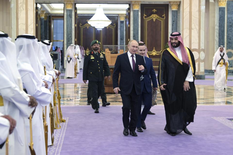 Saudi Crown Prince Mohammed bin Salman, right, and Russian President Vladimir Putin walk for the talks at the Al Yamamah Palace in Riyadh, Saudi Arabia, on Wednesday, Dec. 6, 2023. (Alexei Nikolsky, Sputnik, Kremlin Pool Photo via AP)