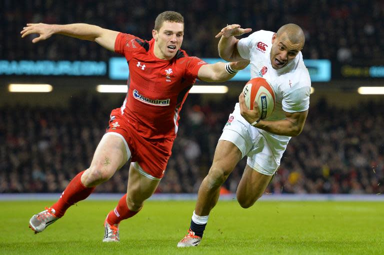 Wales wing George North (L) and England's Jonathan Joseph during their Six Nations match at the Millennium Stadium on February 6, 2015