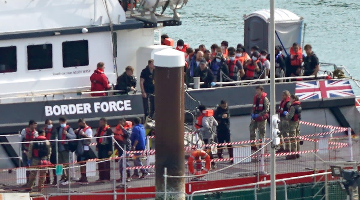 A group of people thought to be migrants are brought in to Dover, Kent, from a Border Force vessel following a small boat incident in the Channel on Thursday (Gareth Fuller/PA) (PA Wire)