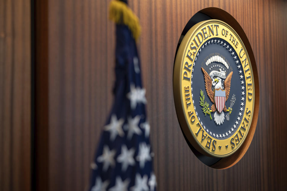 In this image provided by the White House, the presidential seal is displayed in the newly renovated White House Situation Room on Aug. 16, 2023. The 5,500-square-foot, highly secure complex of conference rooms and offices in the West Wing has undergone a gut renovation that took a year to complete. (Carlos Fyfe/The White House via AP)