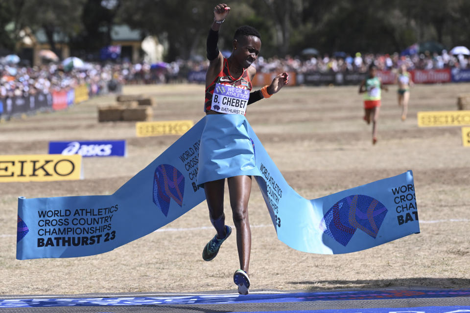 Brenda Chebet of Kenya crosses the finish line to win the mixed relay race at the World Athletics Cross Country Championships in Bathurst, Australia, Saturday, Feb. 18, 2023. (Dean Lewins/AAP Image via AP)