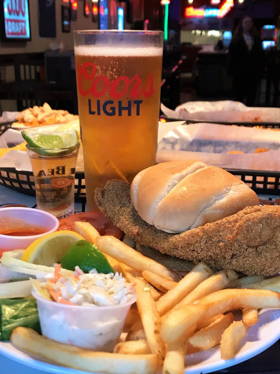 You may now enjoy the large breaded fish sandwich from the former Tiki Time barge bar at Tiki on Main.