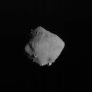 FILE - In this Nov. 13, 2019, file image released by the Japan Aerospace Exploration Agency (JAXA), shows asteroid Ryugu taken by Japan's Hayabusa2 spacecraft. The Japanese space agency said Friday they are all set for the spacecraft′s final approach to Earth this weekend to deliver a capsule containing valuable samples of a distant asteroid that could provide clues to the origin of the solar system. (JAXA via AP, File)