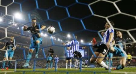 Football - Sheffield Wednesday v Arsenal - Capital One Cup Fourth Round - Hillsborough - 27/10/15 Sam Hutchinson scores the third goal for Sheffield Wednesday Action Images via Reuters / Lee Smith