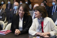 Ximean Fuentes, Chile's vice-minister for foreign affairs, right, and Chile's lawyer Carolina Valdivia Torres, left, wait for the start of the verdict at the World Court in The Hague, Netherlands, Thursday, Dec. 1, 2022, where the UN's top court ruled on a dispute about a river that crosses Chile's and Bolivia's border, in a case seen as important jurisprudence at a time when fresh water is becoming an increasingly coveted world resource. (AP Photo/Peter Dejong)